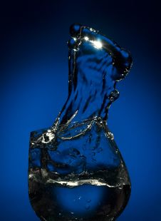 Big Splash Of Fluid In A Glass Royalty Free Stock Photography Big Splash Of Fluid In A Glass Royalty Free Stock Photography