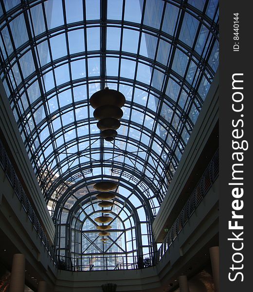 A beautifully designed glass ceiling in a hotel building in the city of Dubai. A beautifully designed glass ceiling in a hotel building in the city of Dubai