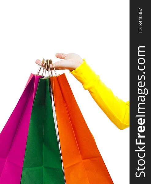 Woman's hand holding shopping bags