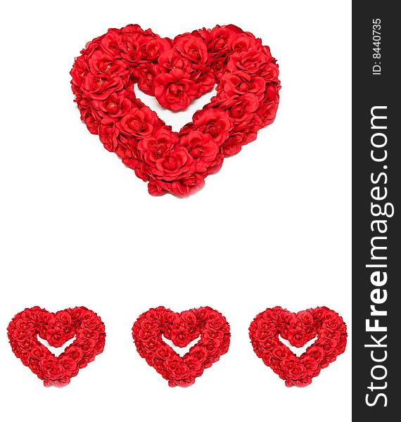 Red roses formed into heart-shaped wreathe. Red roses formed into heart-shaped wreathe.