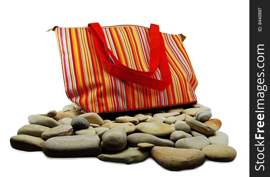 Isolated image of the bag on the rocks, the concept of active rest. Isolated image of the bag on the rocks, the concept of active rest