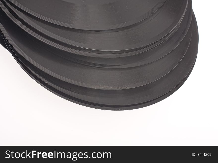 Vintage gramophone vinyl records on white background