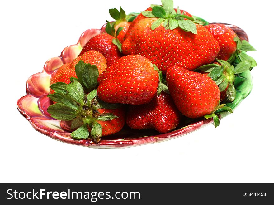 An isolated photo of a bunch of strawberries in a bowl. An isolated photo of a bunch of strawberries in a bowl
