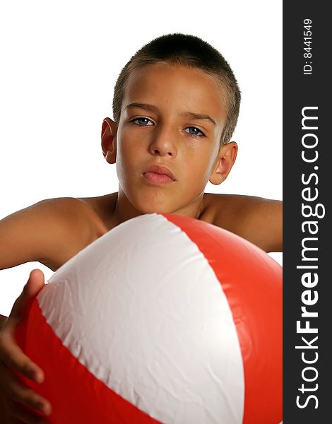 Boy with a big colorful beach ball. Boy with a big colorful beach ball