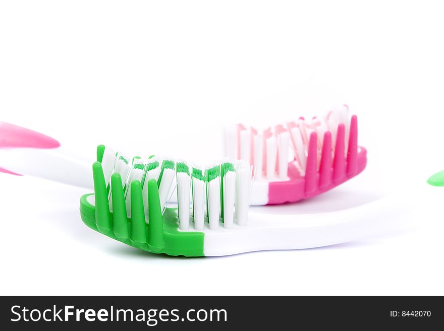 Two toothbrushes on white background