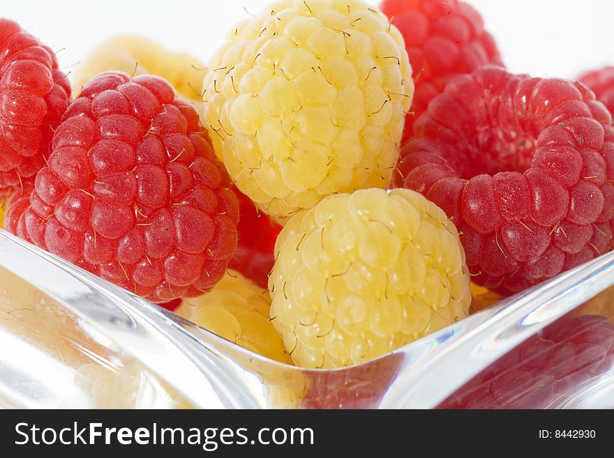 Red and Yellow Raspberries in Crystal Dish