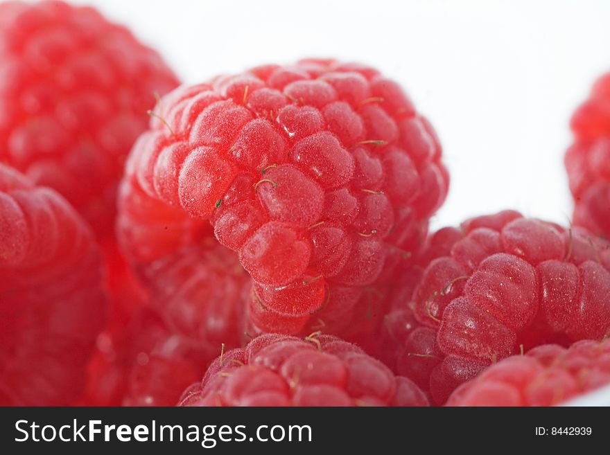 Macro of Raspberries Isolated on a White Background