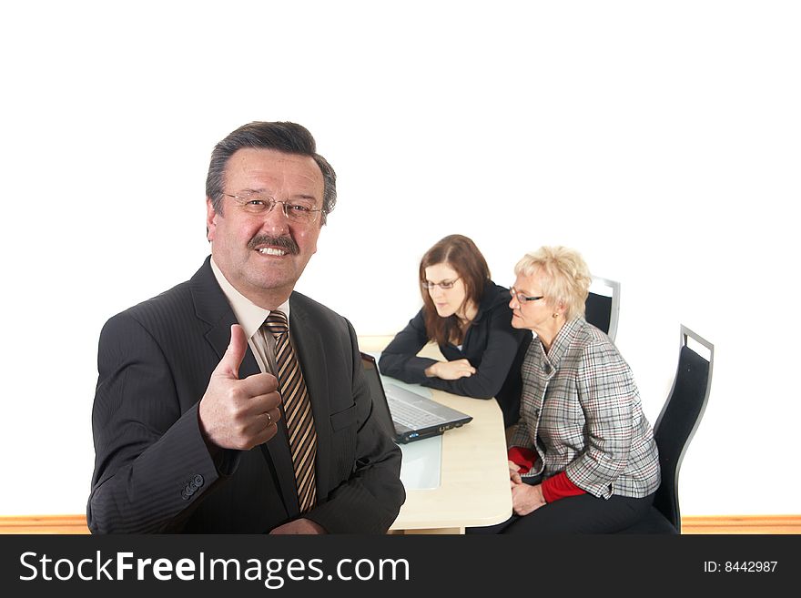 Businessman in office environment. Three people with focus on mature boss in front. Isolated over white. Businessman in office environment. Three people with focus on mature boss in front. Isolated over white.