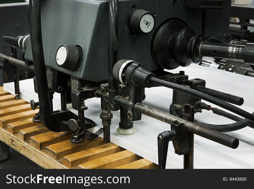 Old equipment for a press in a modern printing house