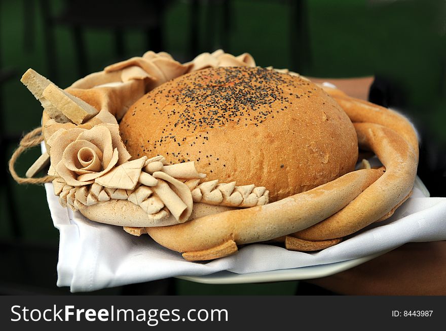 Decorated brown bread with poppy