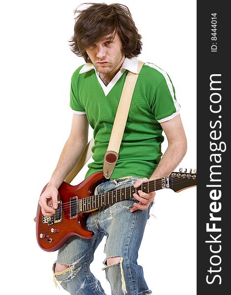 Passionate guitarist playing his electric guitar