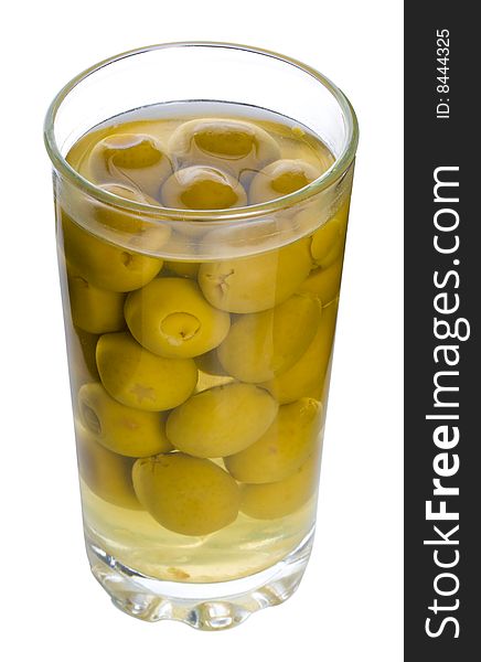 Glass with green olives, isolated on white