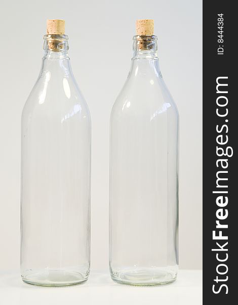 Two bottles on white background