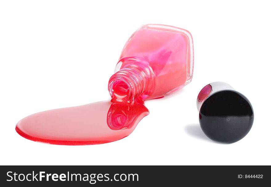 Red nail lacquer spilling, isolated on white. Red nail lacquer spilling, isolated on white