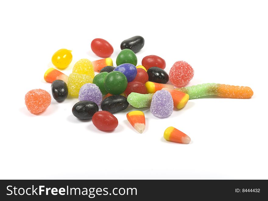 Multicolored pieces of candy isolated on white. Multicolored pieces of candy isolated on white