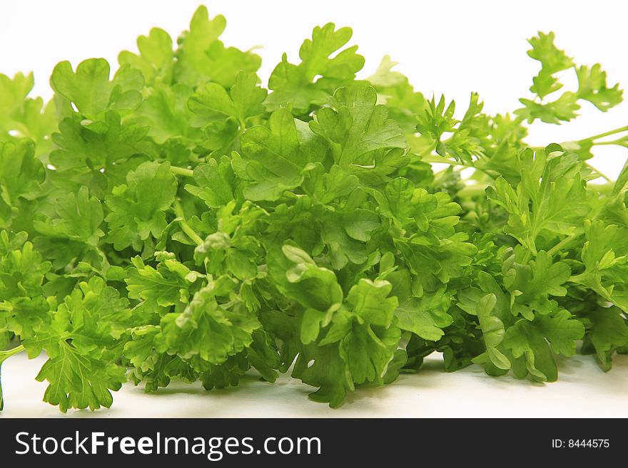 Bunch of parsley isolated on white.