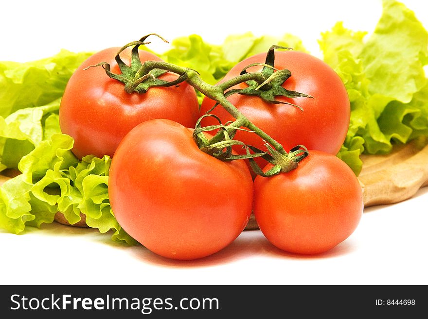 Fresh red tomatoes isolated on white. Fresh red tomatoes isolated on white