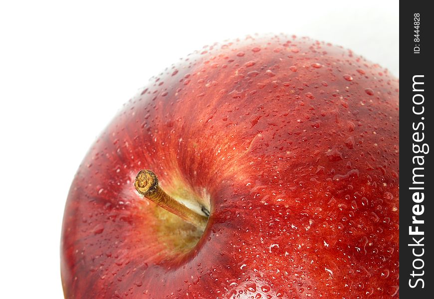 Detail of red apple covered with droplets of water. Detail of red apple covered with droplets of water