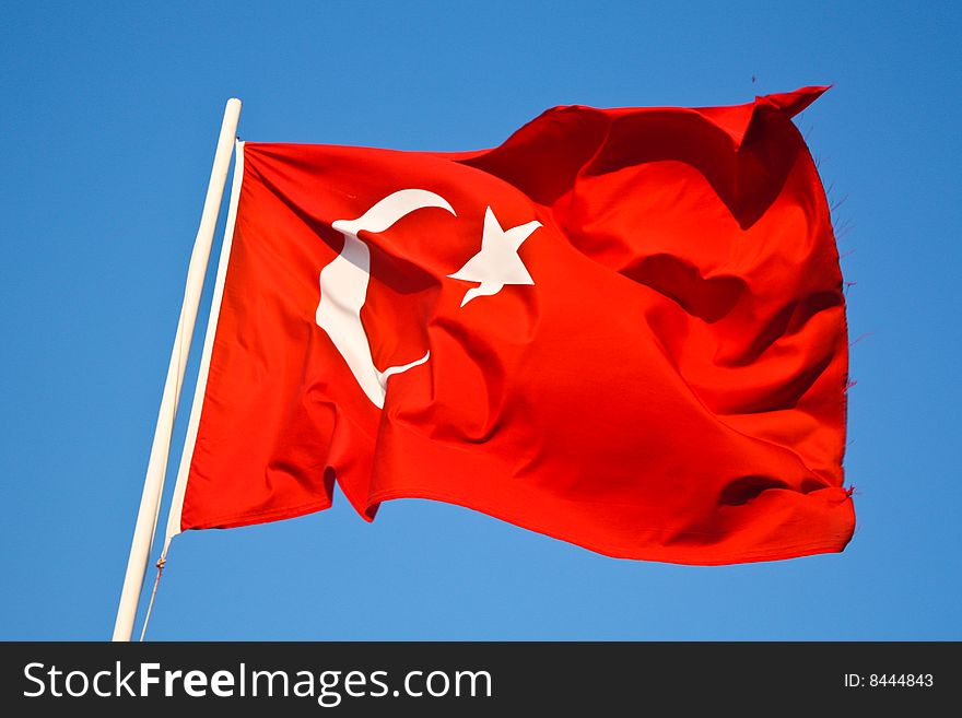 Turkish flag on flagpole waving