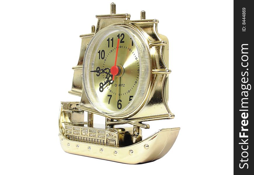 Golden ship-shaped clock on the white background. Golden ship-shaped clock on the white background