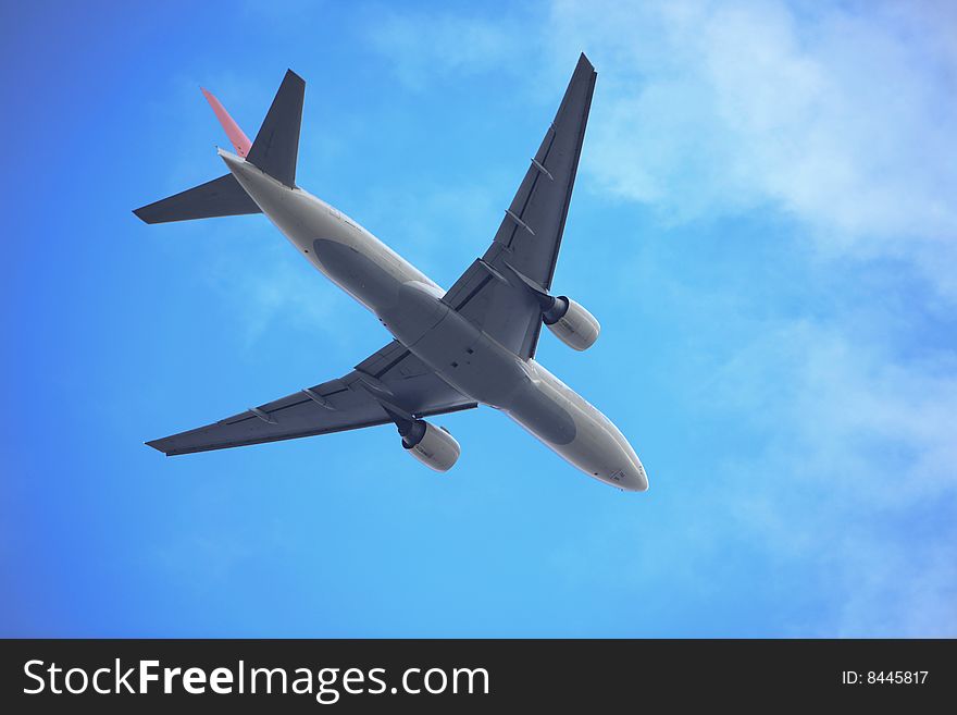 The airplane with blue sky.