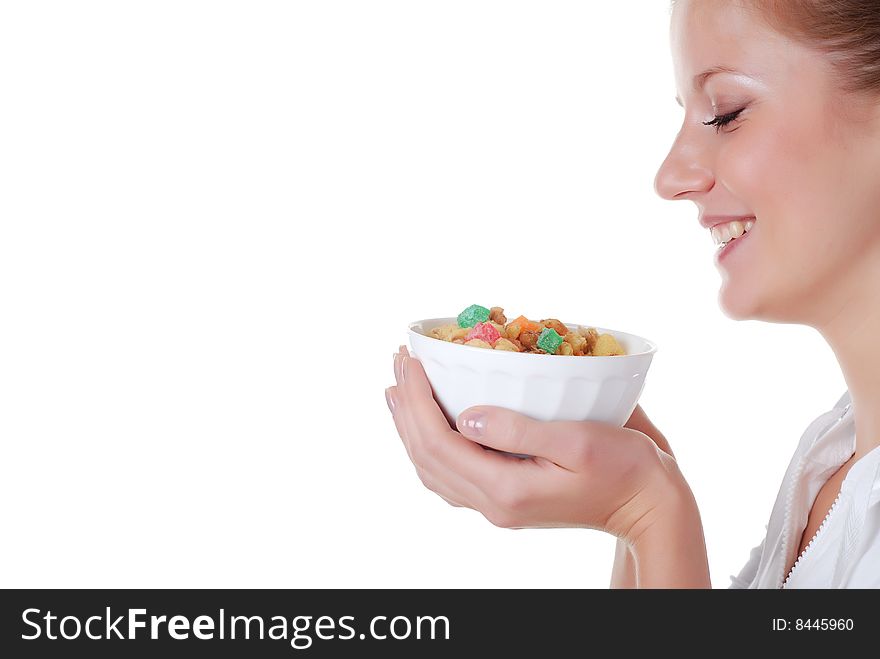 Portrait of young woman with plate of muesli. Portrait of young woman with plate of muesli