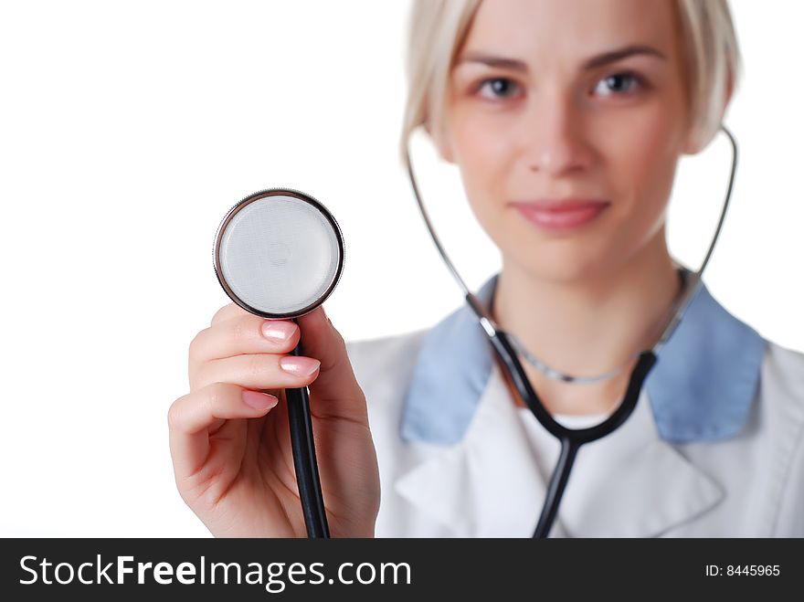 Beautiful nurse with stethoscope on white background