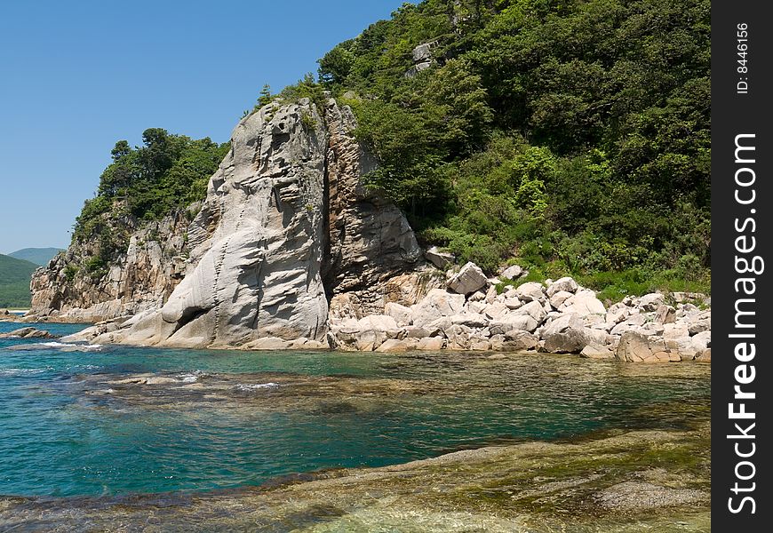 A landscape on roky seacoast of Japanese sea. A landscape on roky seacoast of Japanese sea.