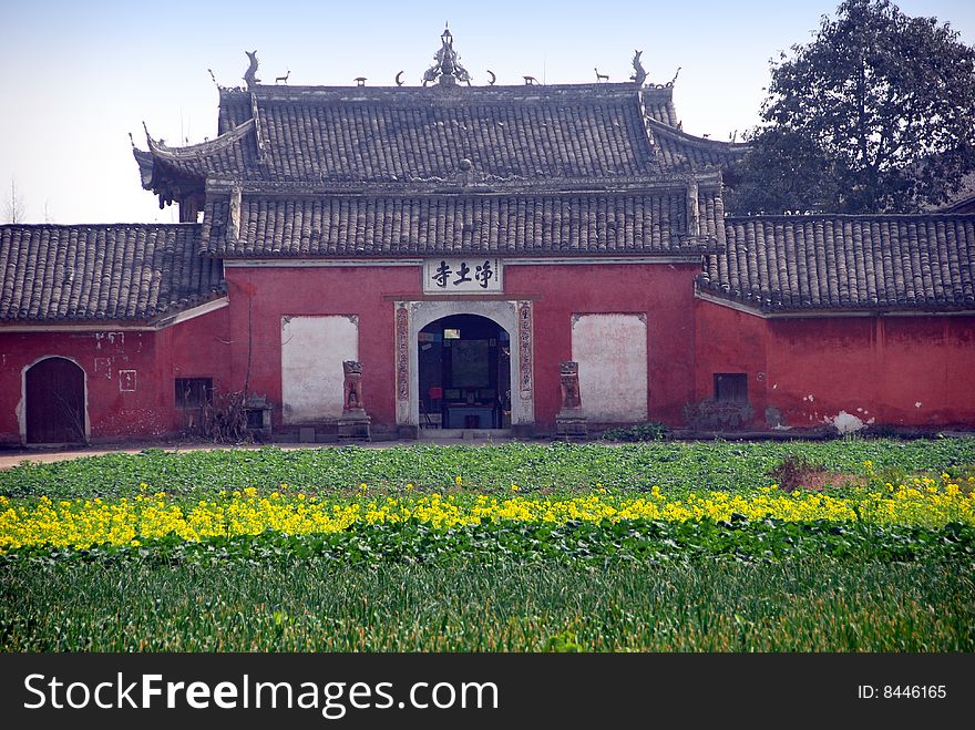 The charming little Jing Tu Buddhist Temple sits amidst farmer's fields in the Pengzhou, China countryside of Sichuan Province - Lee Snider Photo. The charming little Jing Tu Buddhist Temple sits amidst farmer's fields in the Pengzhou, China countryside of Sichuan Province - Lee Snider Photo.