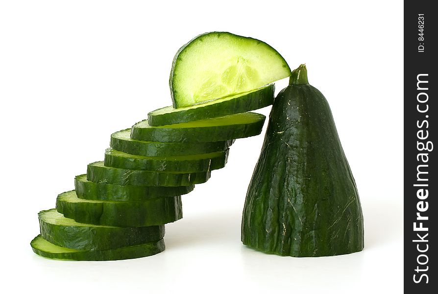 This is a cucumber composition with slices.