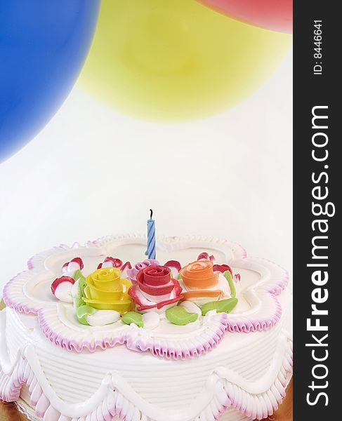 Birthday cake and balloons image