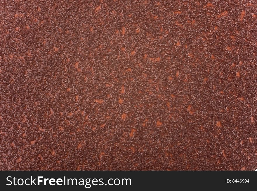 Close up to brown sandpaper useful as background or texture