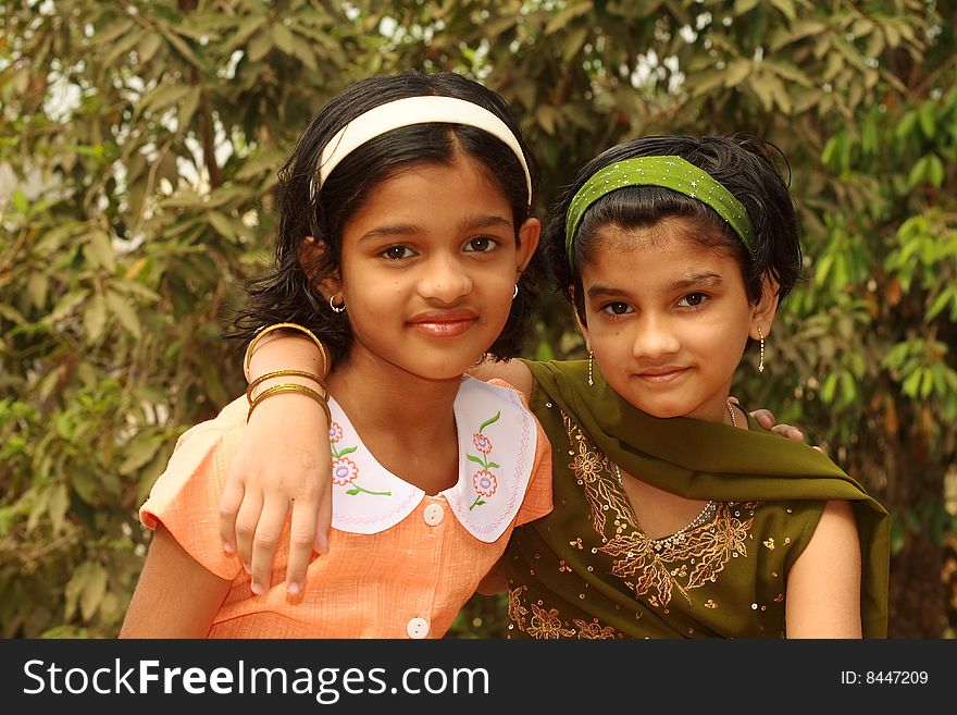A two lovely Indian girls showing their close bond of friendship. A two lovely Indian girls showing their close bond of friendship.