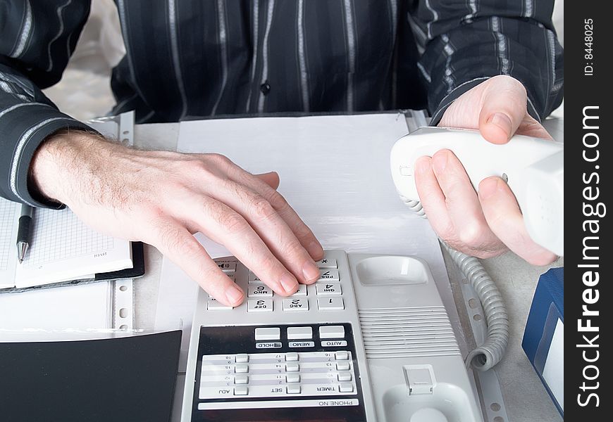 Closeup of mans hand going to write a business plan. Closeup of mans hand going to write a business plan