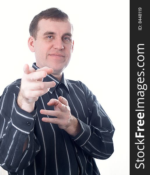 The businessman specifies a finger directly before itself