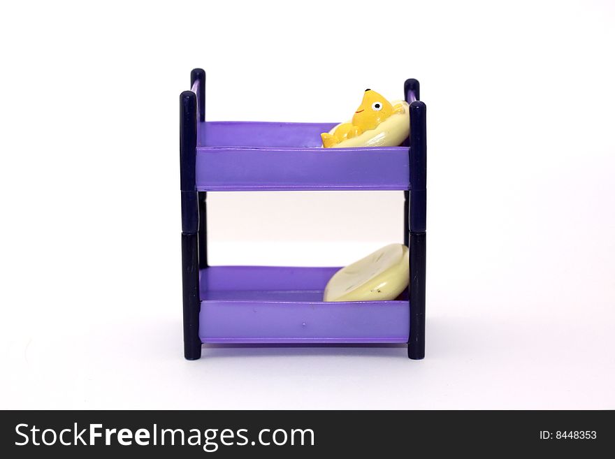 A toy set of plastic bunk beds