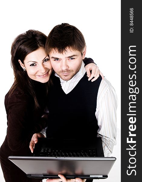 Stock photo: an image of man and woman with black laptop. Stock photo: an image of man and woman with black laptop