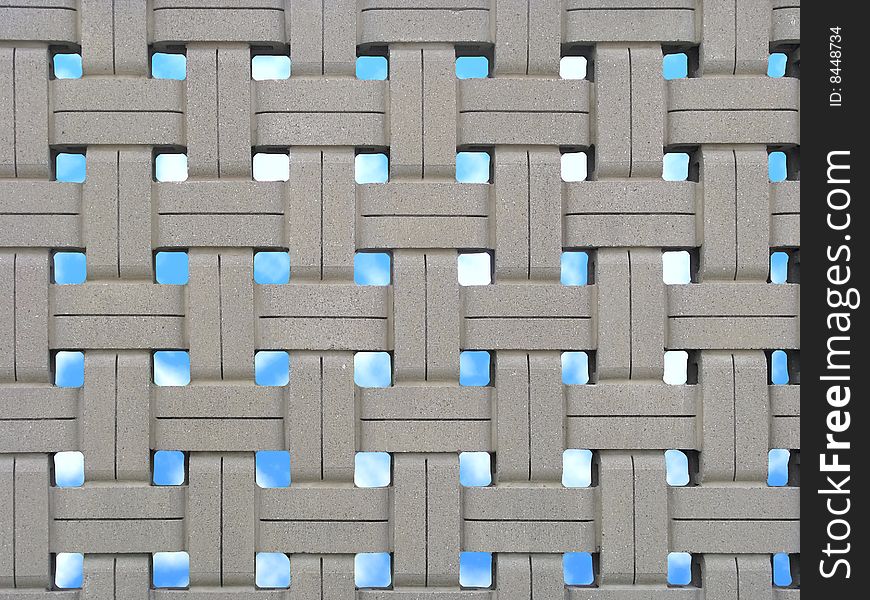 Cement fence under blue sky. Cement fence under blue sky.