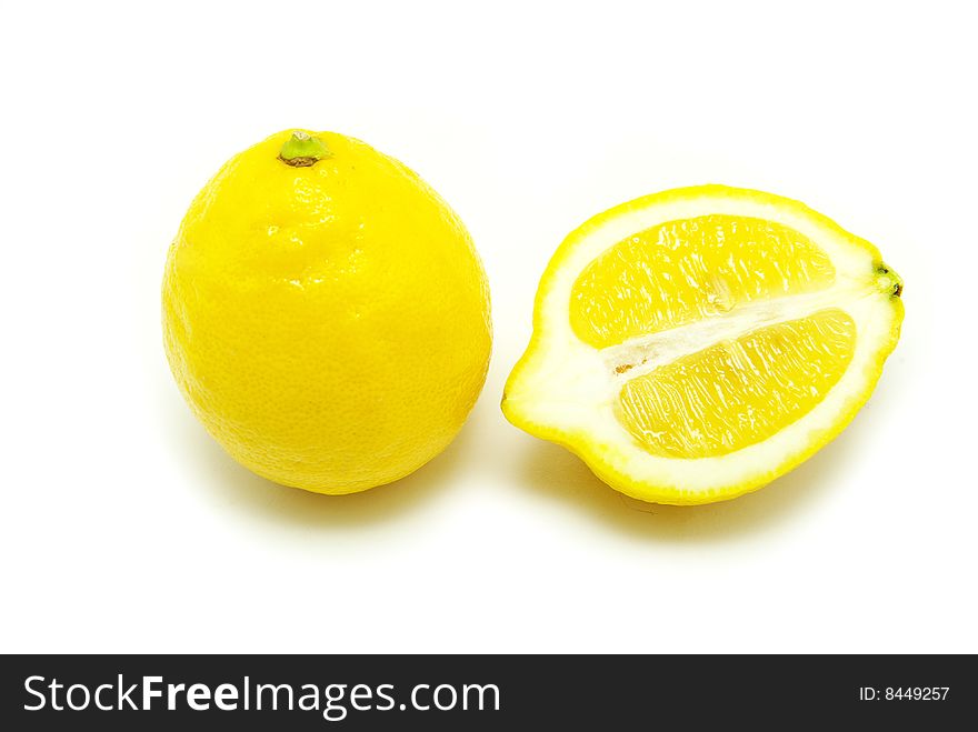 Yellow fresh lemons isolated on a white. Yellow fresh lemons isolated on a white