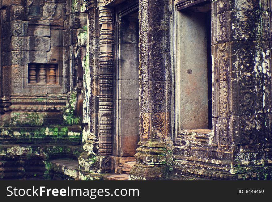 Inside view of Angkor Wat (Bayon Temple) The Bayon (Khmer language - Prasat Bayon) is a well-known and richly decorated Khmer temple at Angkor in Cambodia. Built in the late 12th century or early 13th century as the official state temple of the Mahayana Buddhist King Jayavarman VII, the Bayon stands at the centre of Jayavarman's capital, Angkor Thom.