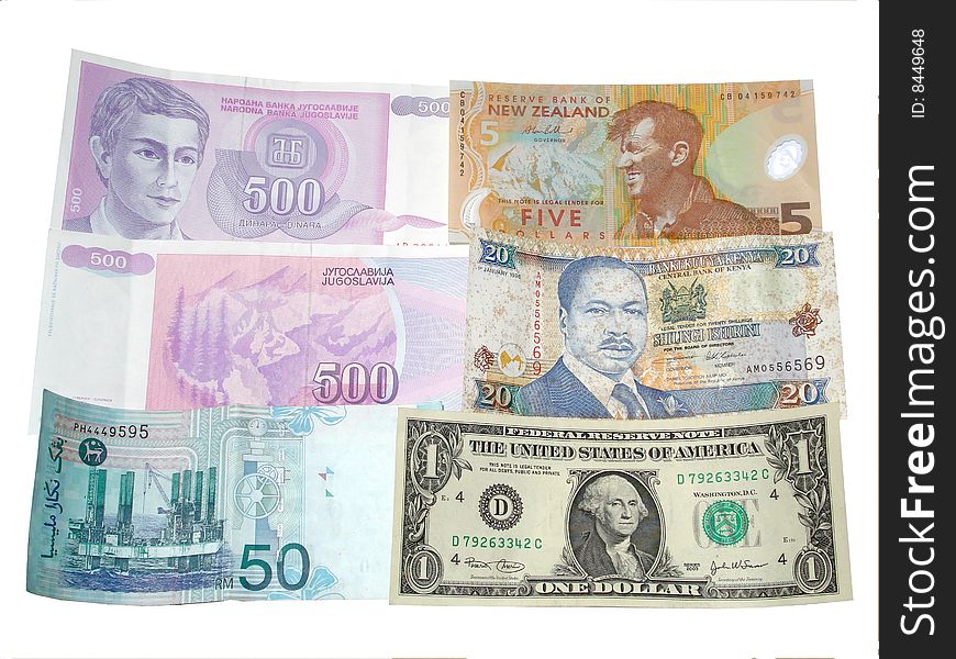 A photo of multiple country currency such as Malaysian Ringgit US Dollar New Zealand 5 Dinara 500 and Kenya's 20 shillings. A photo of multiple country currency such as Malaysian Ringgit US Dollar New Zealand 5 Dinara 500 and Kenya's 20 shillings.