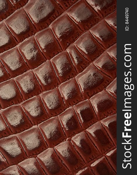 Fine red leather texture (crocodile patterns), macro