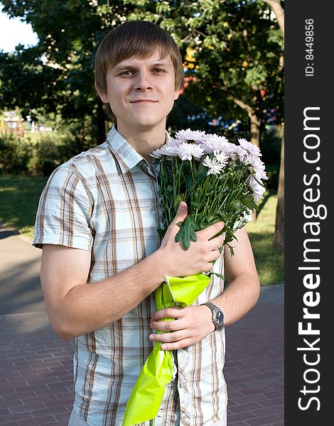 Boy Presenting Flowers