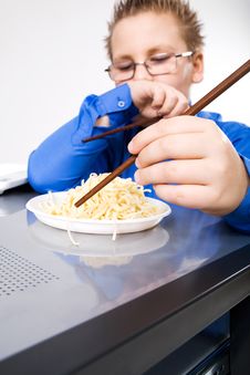 Hungry Boy Eating Chinese Noodles With Sticks Stock Images Hungry Boy Eating Chinese Noodles With Sticks Stock Images