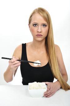 A Woman Use Chopsticks Eating Rice Stock Photos