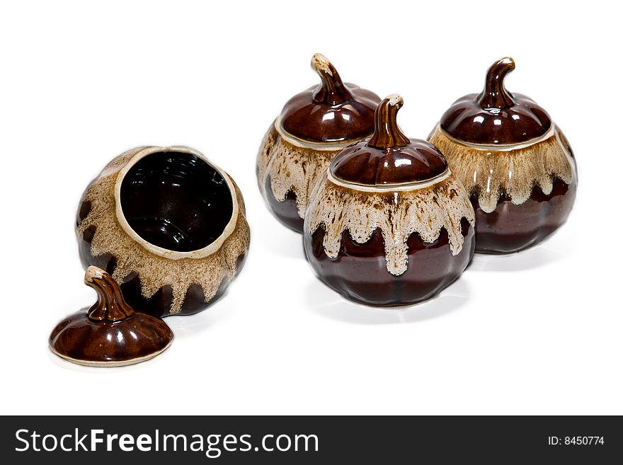 Brown clay pots on a white background