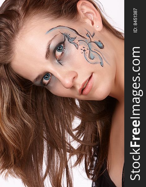 Female model with long brown hair and fantacy makeup. Female model with long brown hair and fantacy makeup