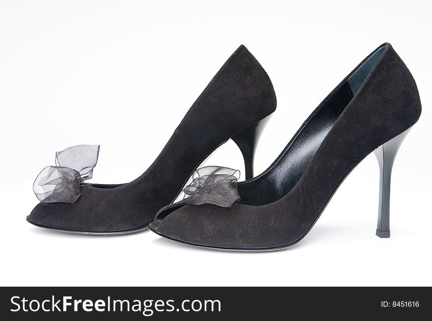 Black suede female shoes, isolated on white background