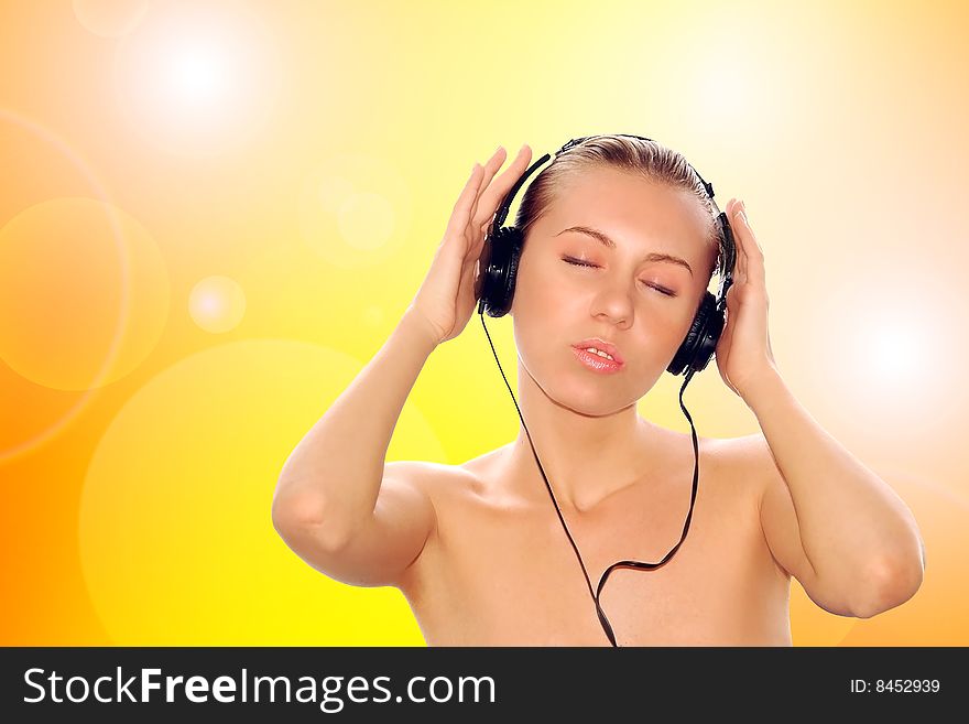 Portrait of happiness young women with beautiful face in headphones and listening music on white. Portrait of happiness young women with beautiful face in headphones and listening music on white