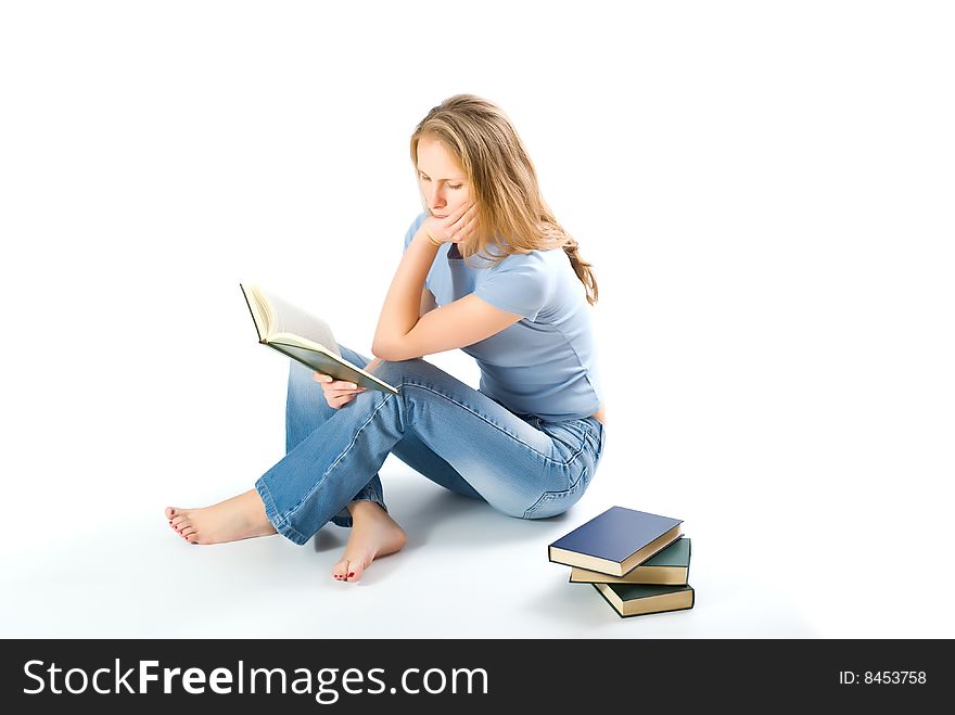 Young girl with books isolated on white